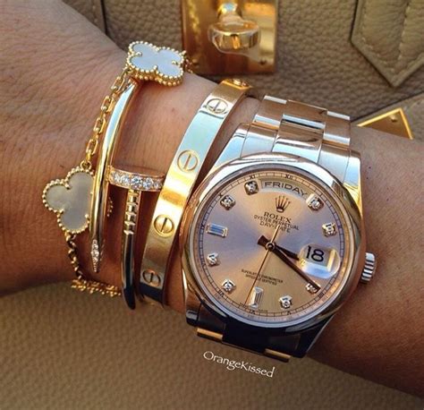 cartier love bracelet or rolex watch